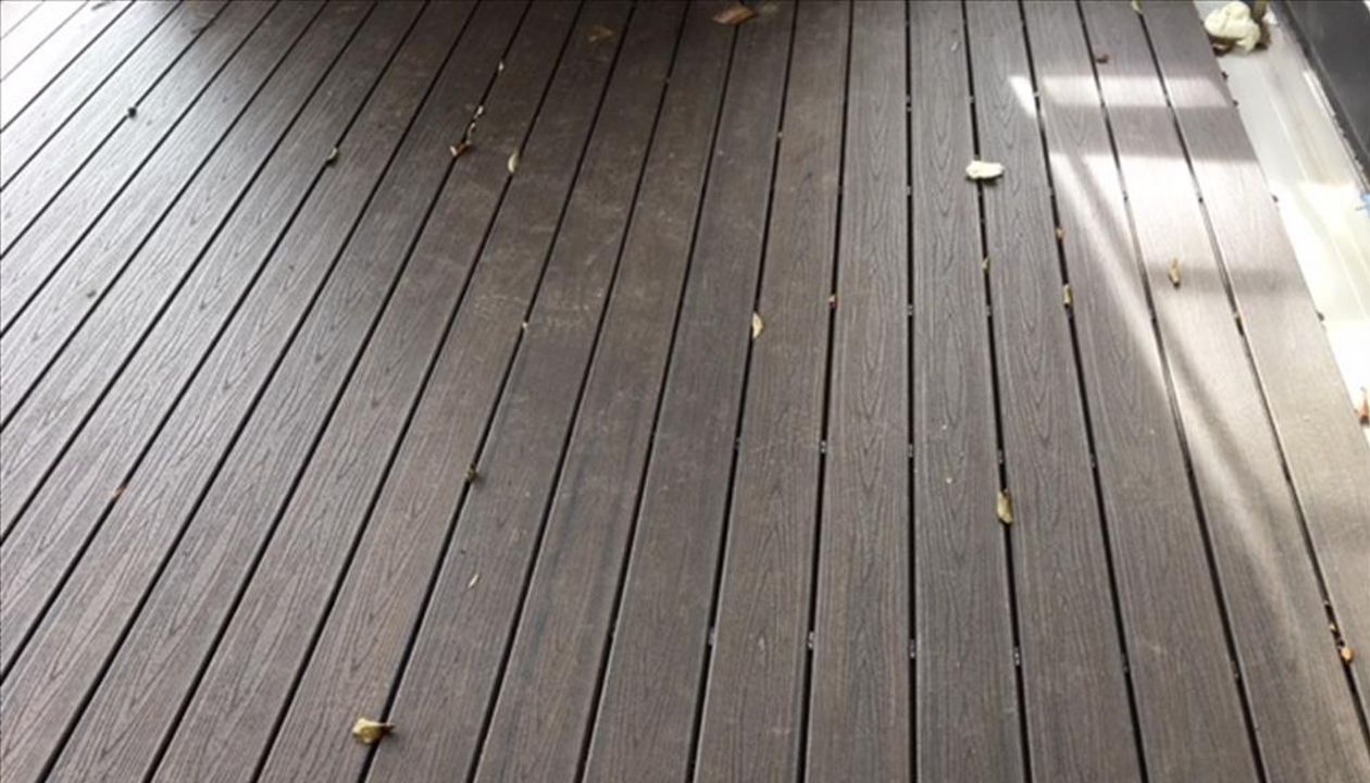 Trex Transcend Spiced Rum decking with Trex Universal Hideaway fasteners outshine natural hardwood decking for looks and ease of maintenance.