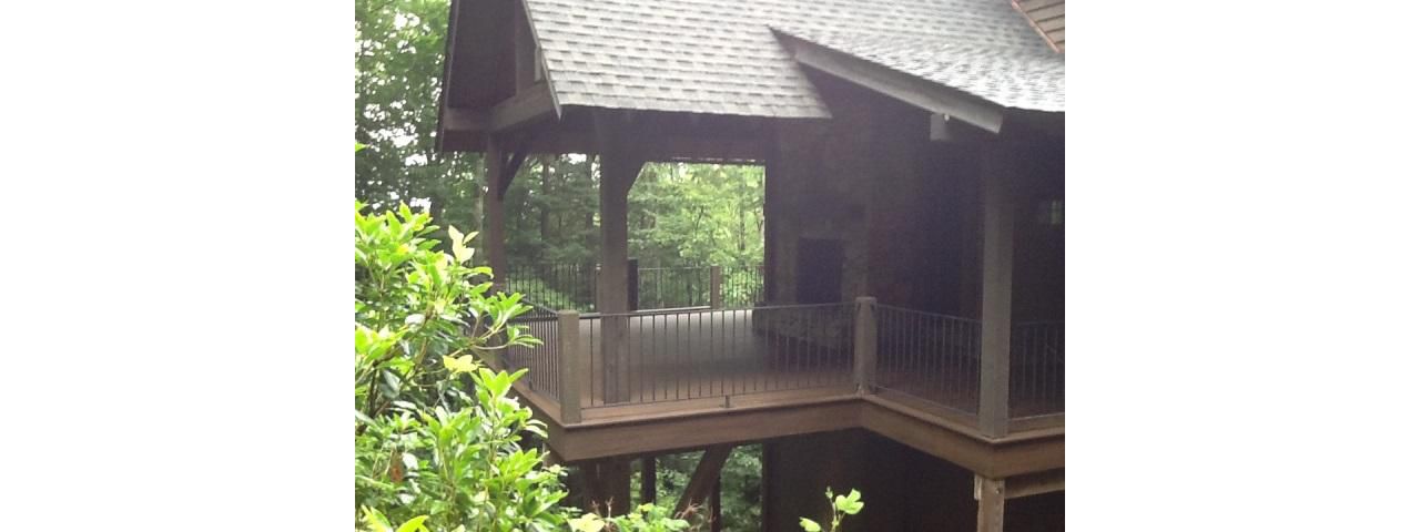 Trex Transcend Spiced Rum deck goes great with these rustic cedar columns.