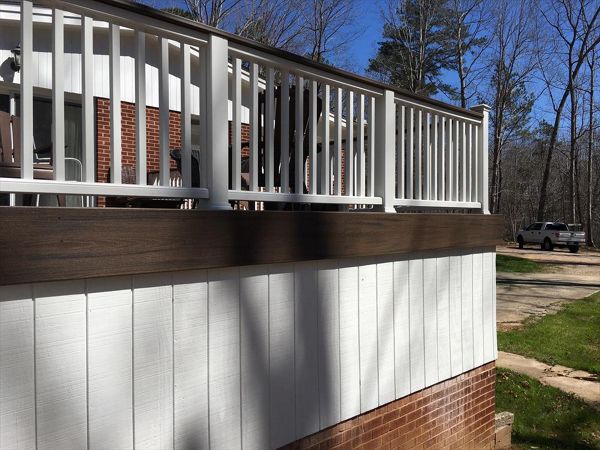 Trex Transcend Spiced Rum fascia board finishes this unique outdoor living area