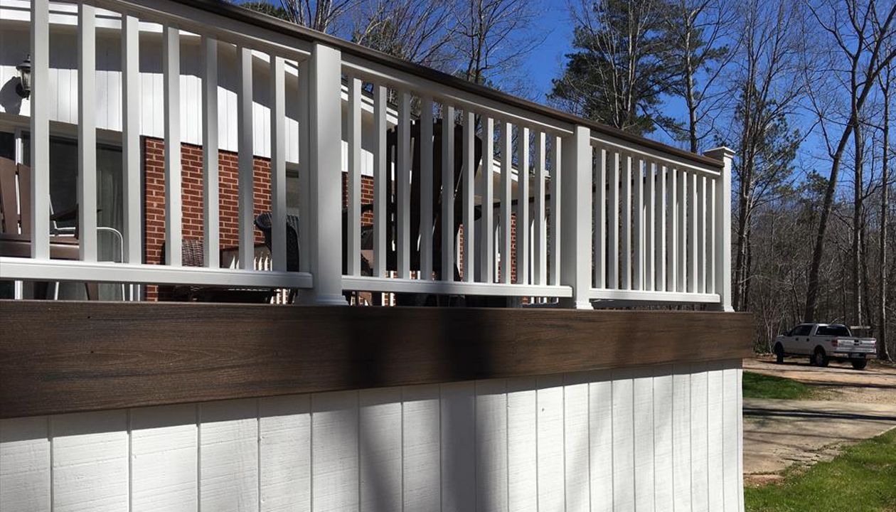 Trex Transcend Spiced Rum fascia board finishes this unique outdoor living area