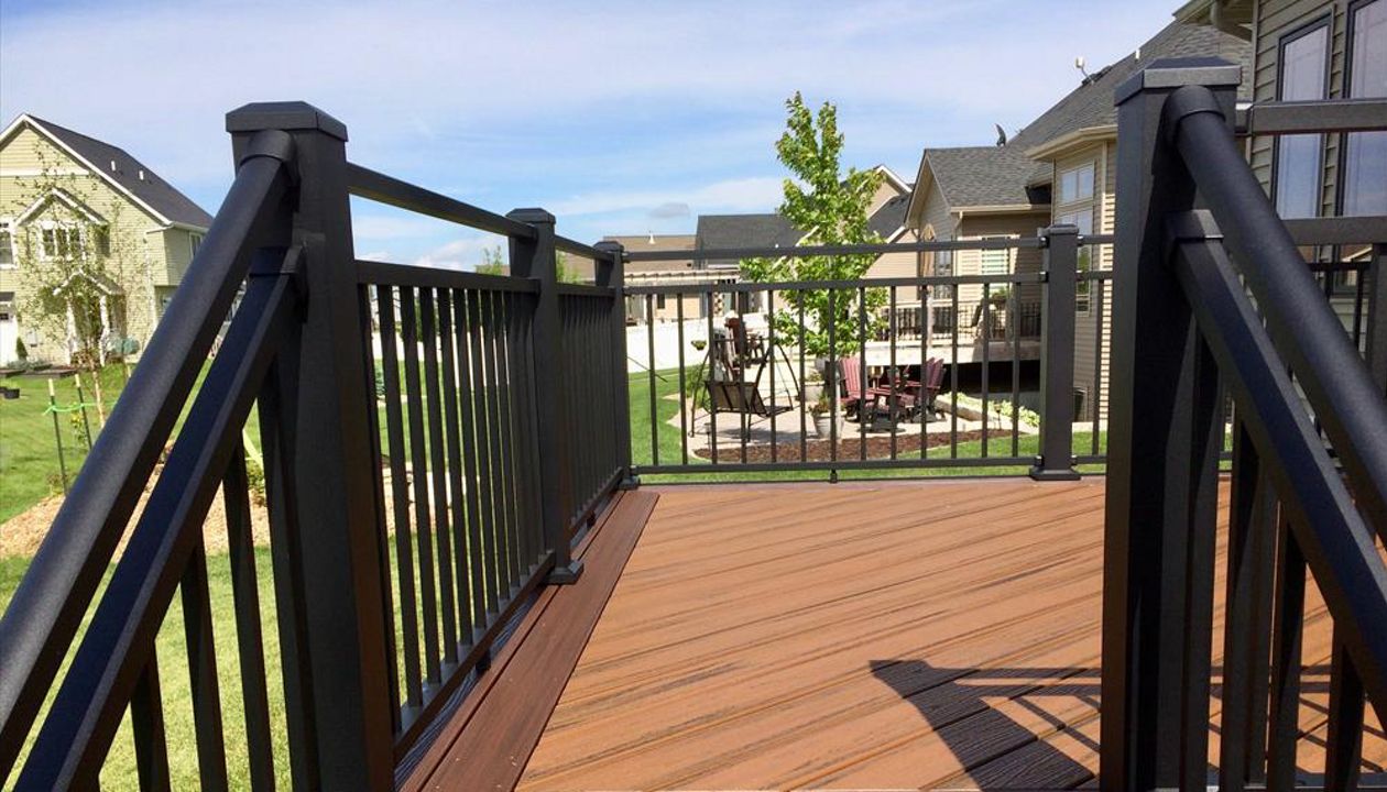 Transcend Decking - Spiced Rum main field &amp; Lava Rock picture frame/ fascia.