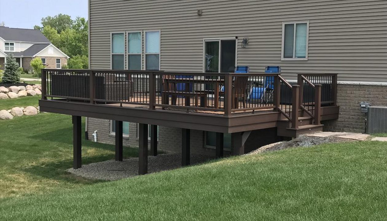 Trex Transcend Vintage Lantern Border/Fascia W/ Trex Transcend Spiced Rum Deck Boards, Trex Transcent Cocktail Style Rail W/ Trex Transcend Black Aluminum Balusters, Oakland, MI