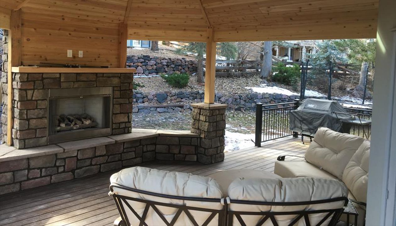 Spiced Rum decking, tongue and grove ceiling, custom fireplace and rail