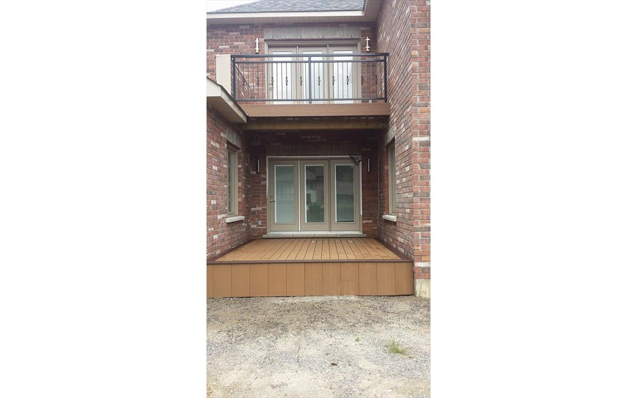 Double Decker Deck. The upper level has rain escape for the home owners to be protected on the lower level. We like to use 1 or 2 board borders to accent the deck. Colours are Beach Dune as main board, boarder Vintage Lanter. A fun projecft.