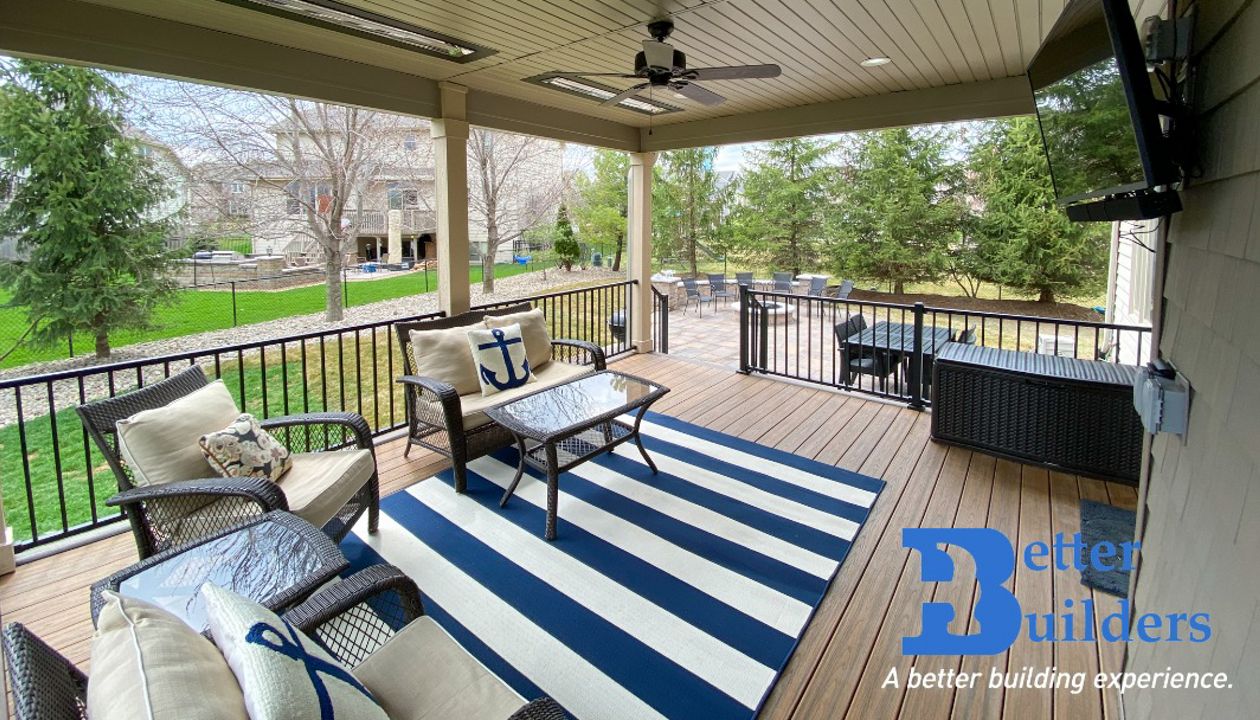 Trex Transcend decking and Signature railing with Rain Escape - Better Builders of Iowa - Covered Deck and Patio project in West Des Moines, IA