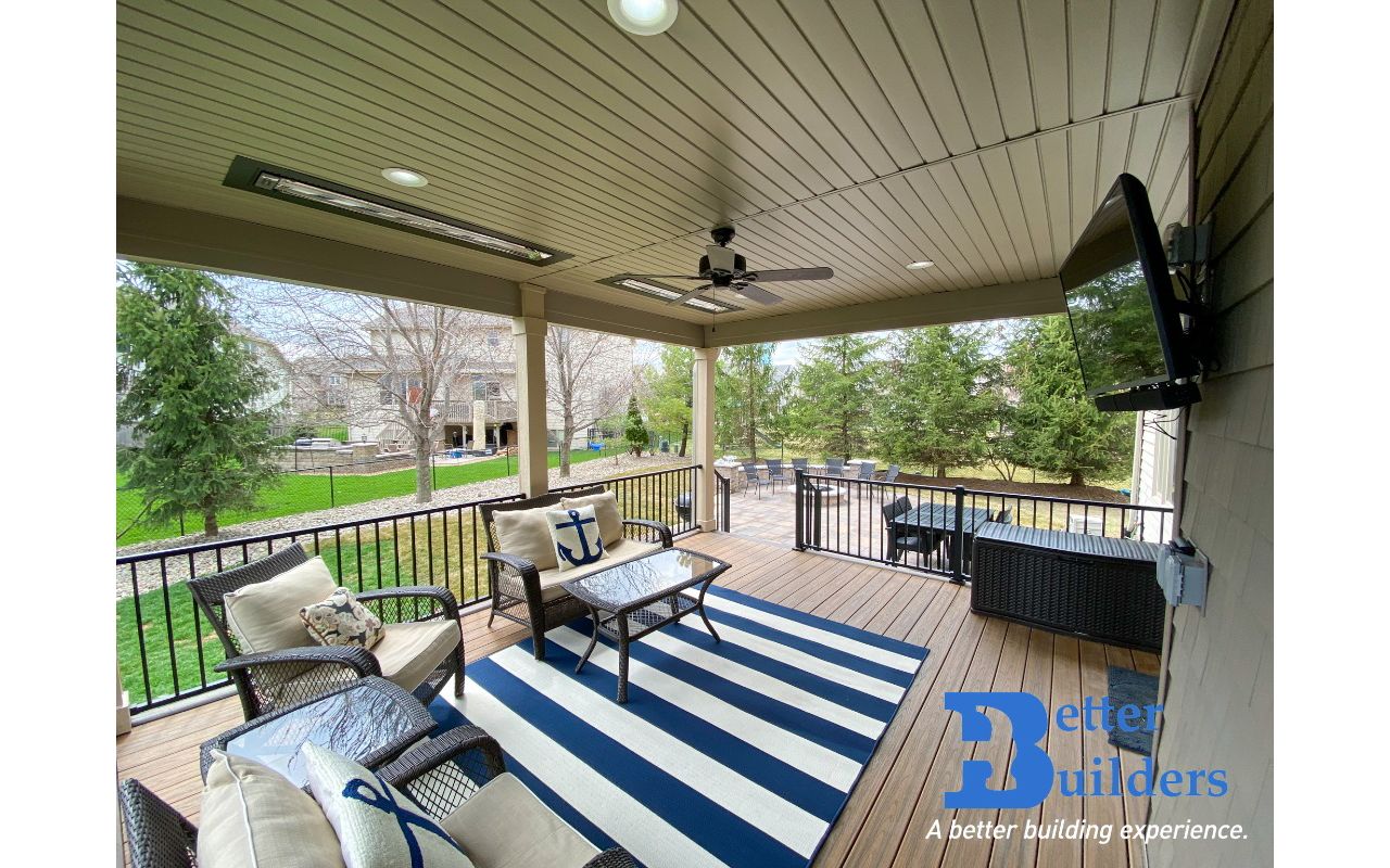 Trex Transcend decking and Signature railing with Rain Escape - Better Builders of Iowa - Covered Deck and Patio project in West Des Moines, IA