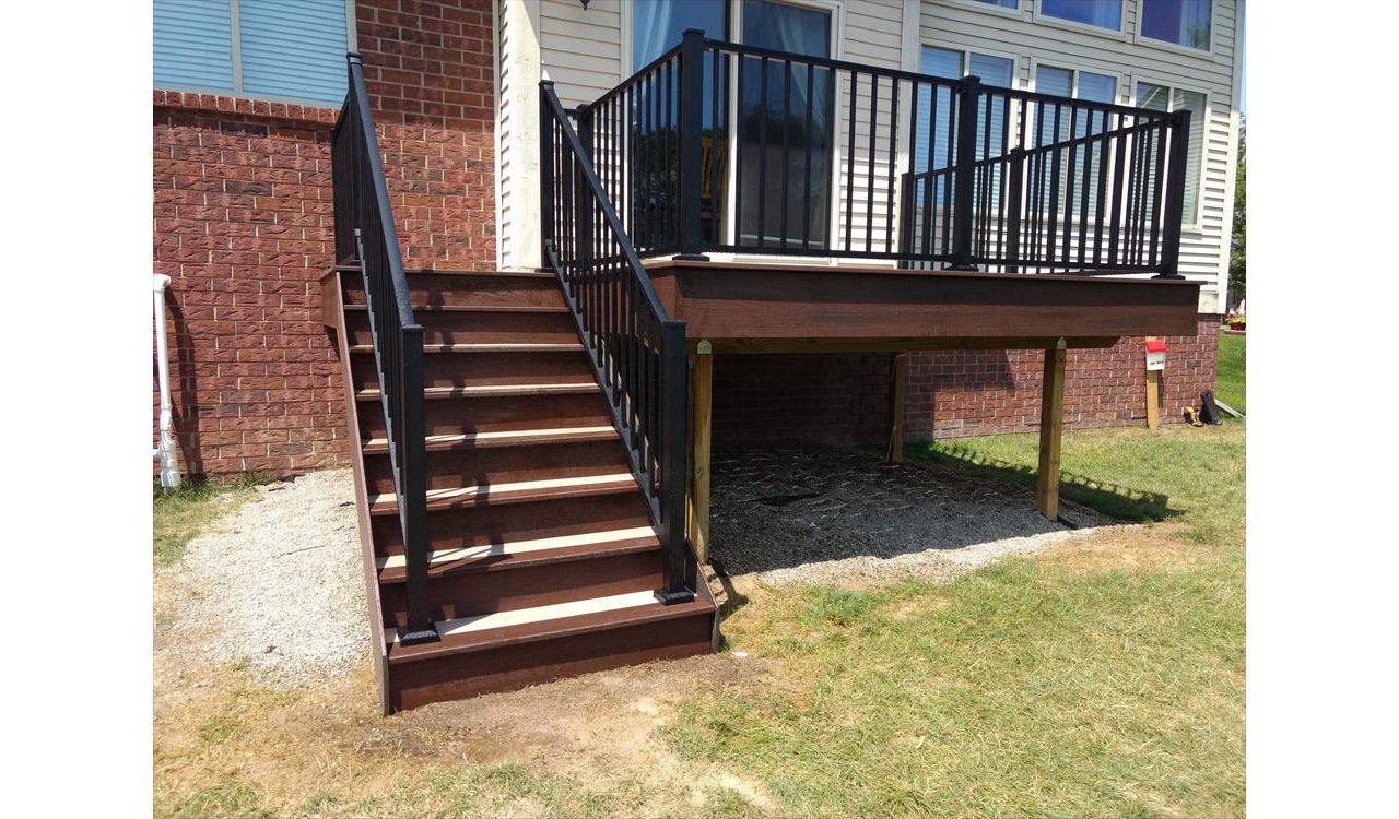 Rope Swing with Lava Rock border and Black Aluminum railing