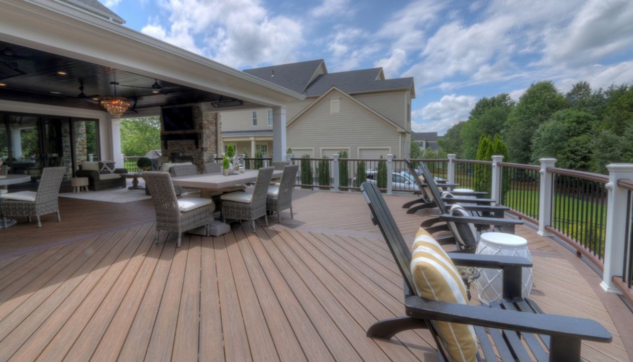 Trex Transcends Curved Deck, Open Porch, Fireplace, Rain Escapes