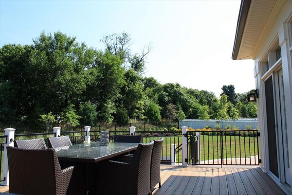 Trex deck with dining area looking towards the front walkway