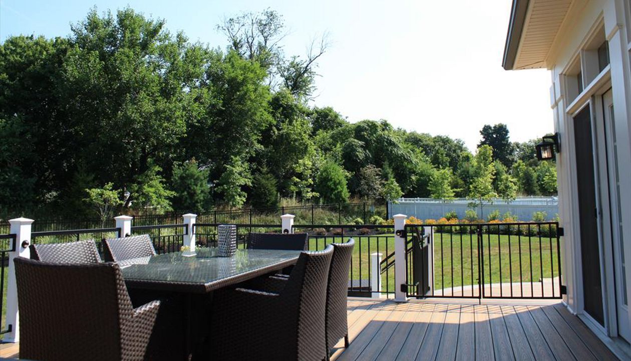 Trex deck with dining area looking towards the front walkway