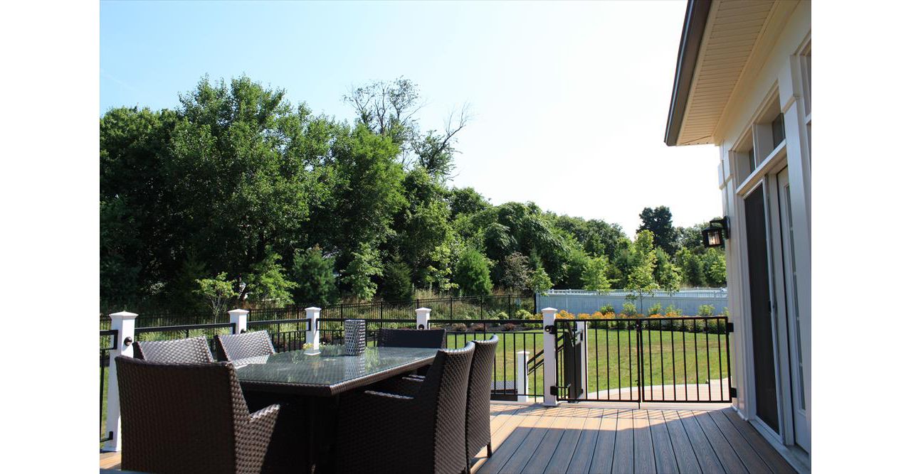 Trex deck with dining area looking towards the front walkway