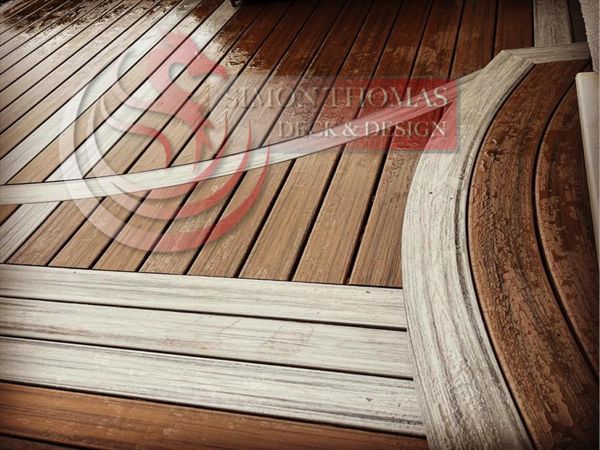 Trex Transcend Spiced Rum field with Island mist boarder custom curve design fitted at Mumbles Swansea.