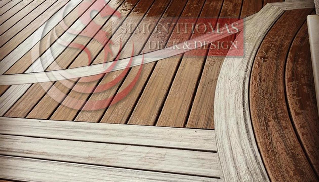 Trex Transcend Spiced Rum field with Island mist boarder custom curve design fitted at Mumbles Swansea.