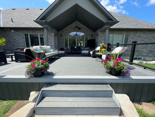 Main: Trex Enhance Basics in Clam Shell. Trim: Trex Enhance Naturals in Foggy Wharf. Contact Align Decking today for your custom composite decking needs. Servicing Toronto, Durham Region, Kawartha Lakes, and the Barrie & Orillia areas.