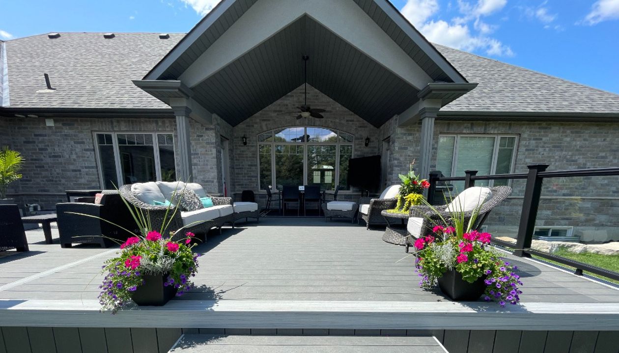 Main: Trex Enhance Basics in Clam Shell. Trim: Trex Enhance Naturals in Foggy Wharf. Contact Align Decking today for your custom composite decking needs. Servicing Toronto, Durham Region, Kawartha Lakes, and the Barrie & Orillia areas.