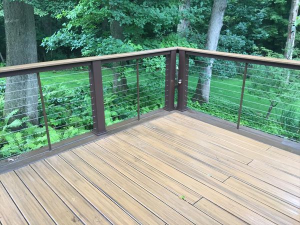 Havana Gold Transcend with Spiced Rum Border. Vintage Lantern Posts, Havana Gold Cocktail Railing. Cable Railing with Custom Powder Coated Spacers. Hidden Fasteners.