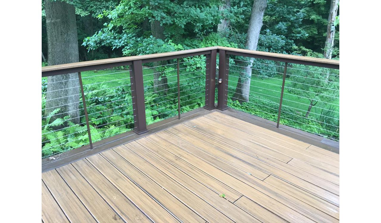 Havana Gold Transcend with Spiced Rum Border. Vintage Lantern Posts, Havana Gold Cocktail Railing. Cable Railing with Custom Powder Coated Spacers. Hidden Fasteners.