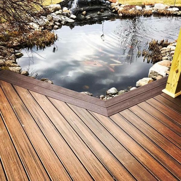 Enjoying a koi pond from the Trex deck