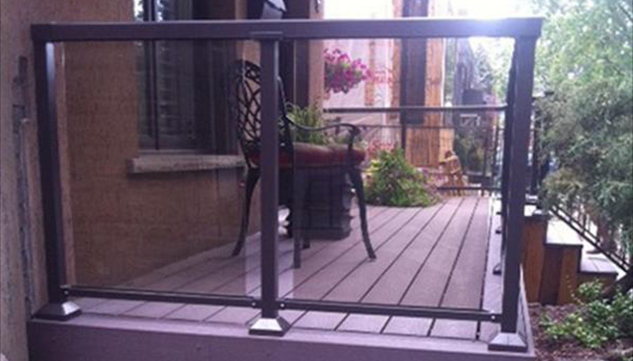 Trex Transcend Gravel Path custom made COMPOSITE porch with black aluminum railing and solid skirting.The Porch built in Toronto, Mississauga, Scarborough, Etobicoke, North York, Markham, Richmond Hill, Thornhill, Vaughan