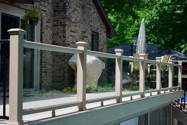 Custom designed deck with Transcend railing and glass panels