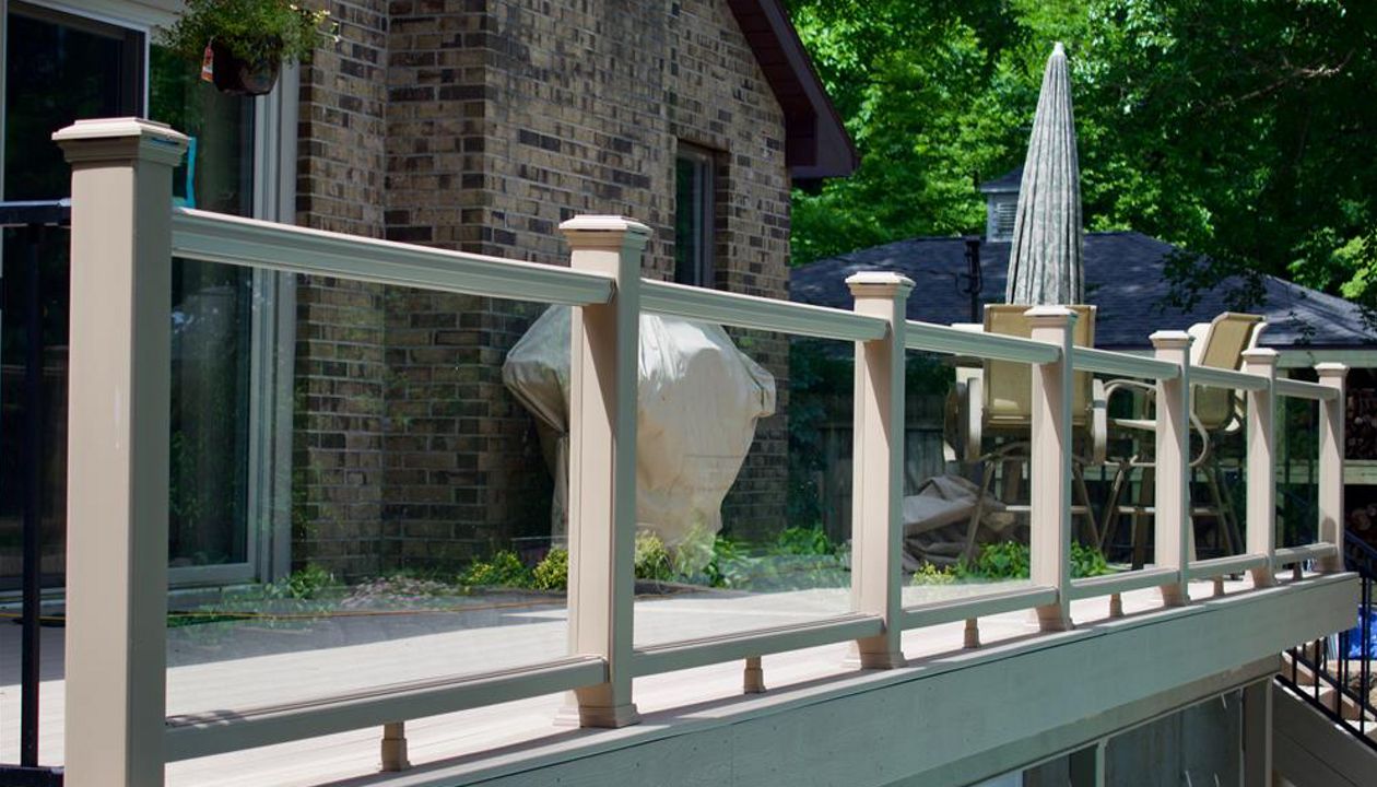 Custom designed deck with Transcend railing and glass panels