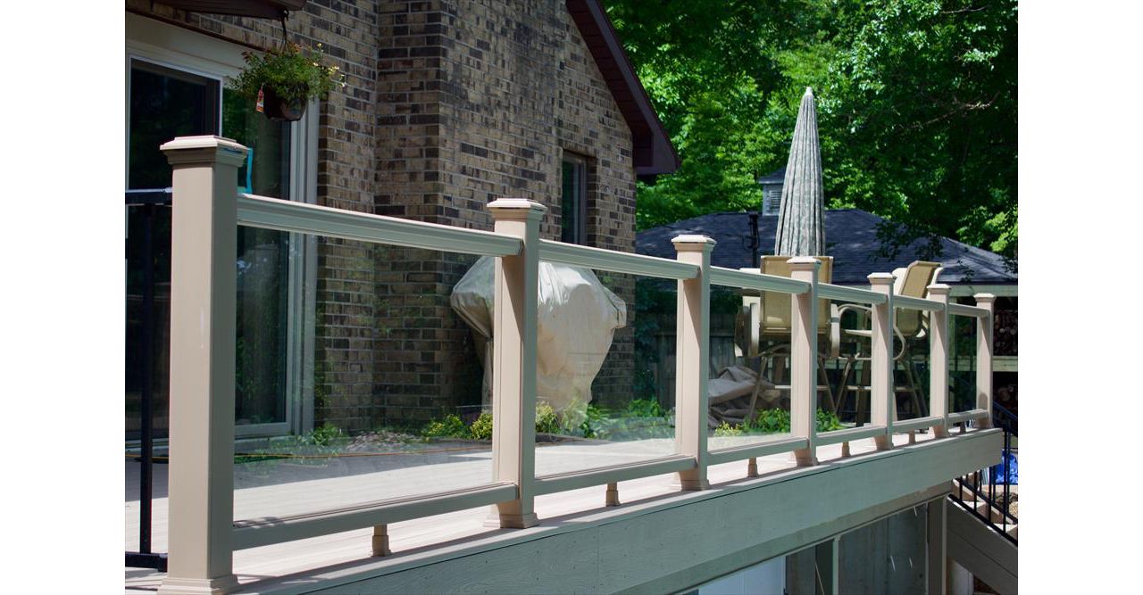 Custom designed deck with Transcend railing and glass panels