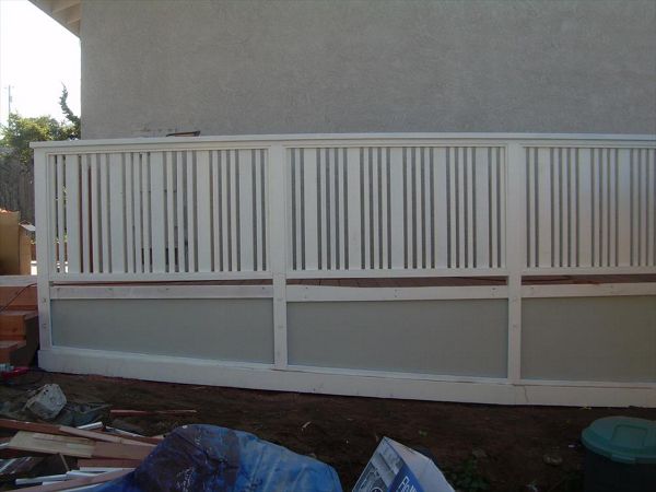 Custom Trex deck with custom redwood handrail