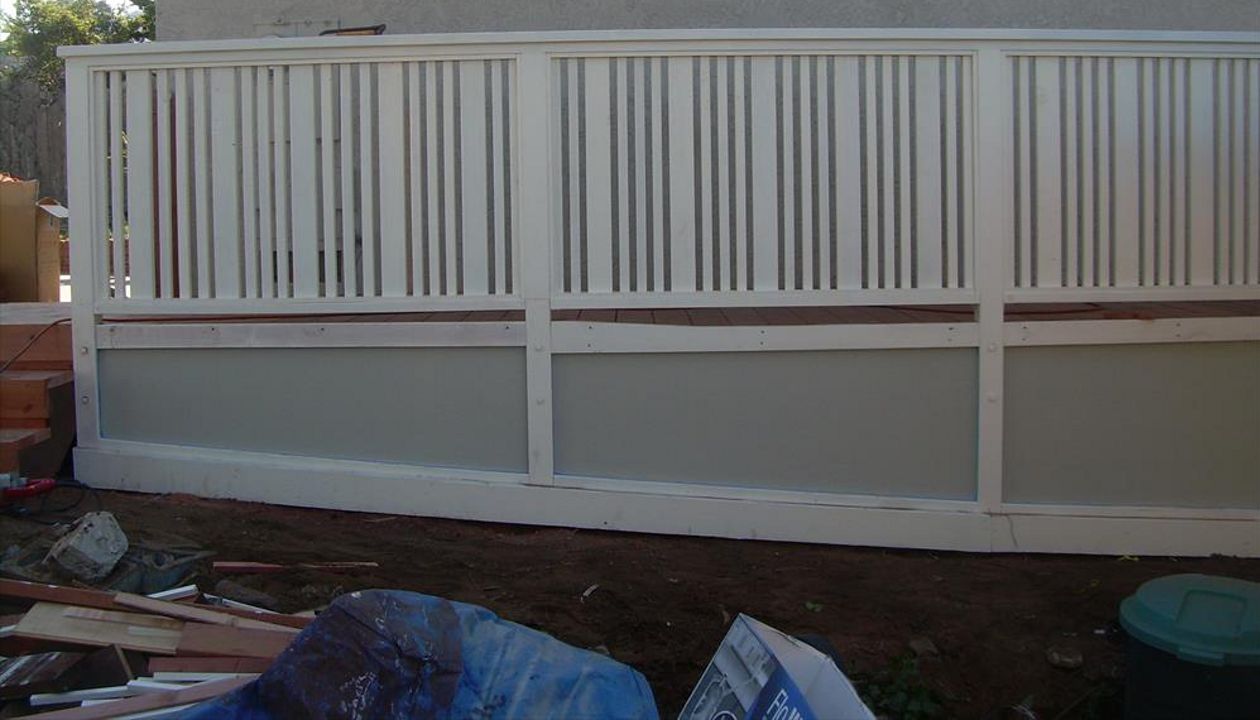 Custom Trex deck with custom redwood handrail