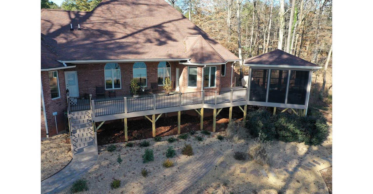 Beautiful Rope Swing composite deck connected to a screened in Gazebo
