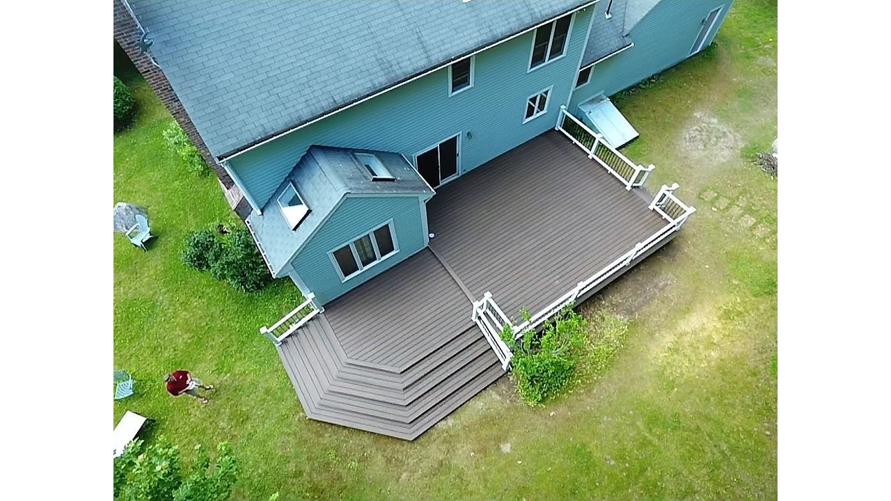 Spiced Rum Decking & Black Round Balusters