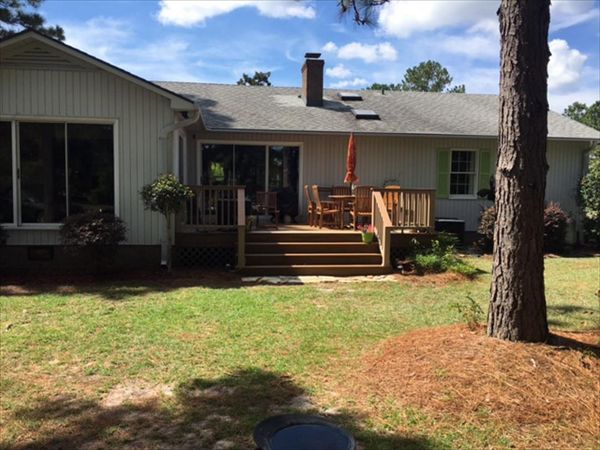 Trex Transcend Havana Gold deck with Rope Swing picture frame & railing in New Bern, NC.