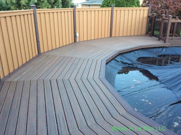 Trex Seclusions privacy fencing around Spiced Rum pool deck.