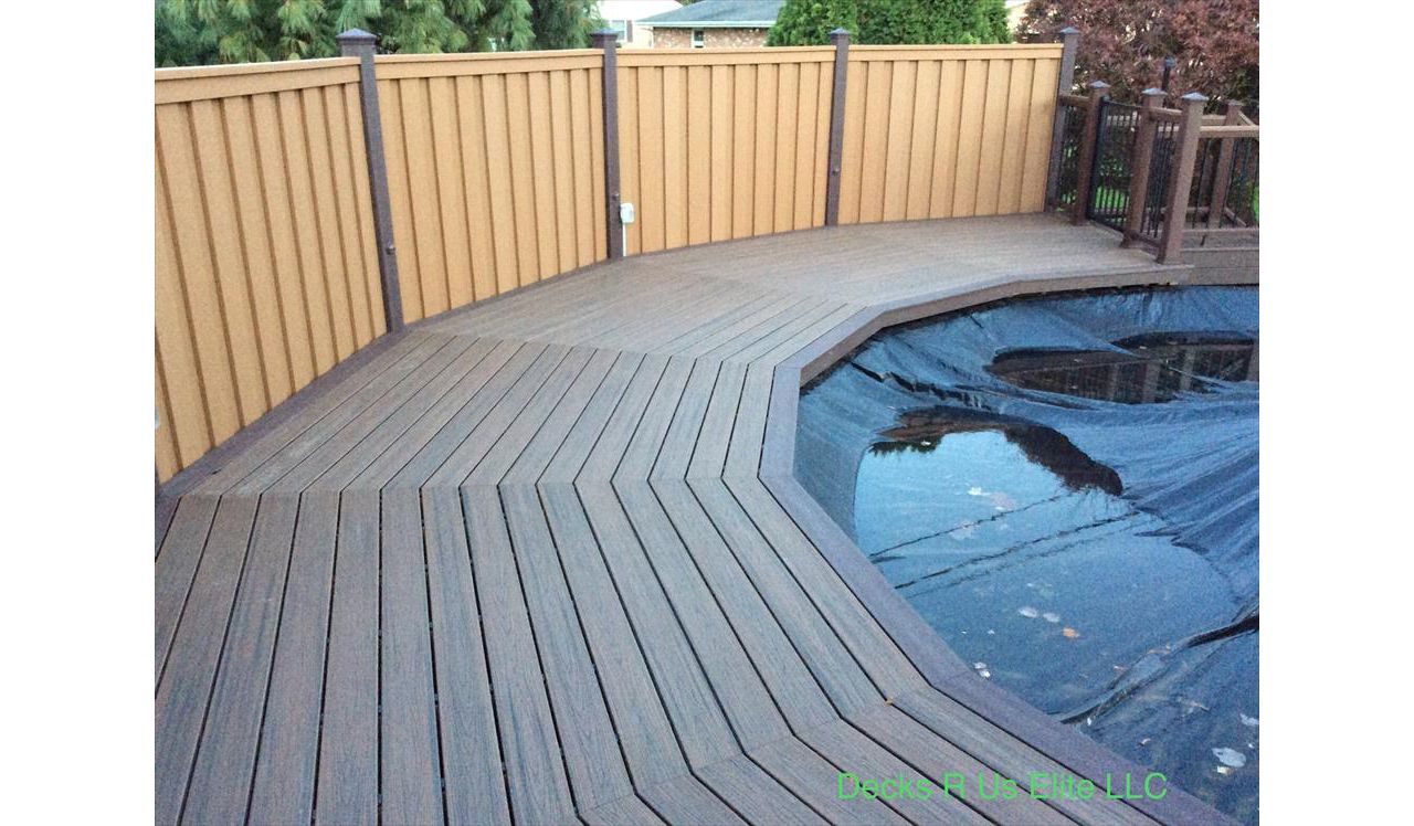 Trex Seclusions privacy fencing around Spiced Rum pool deck.
