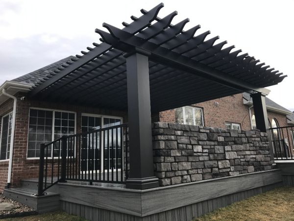 Trex Island mist, signature railing, along with outdoor kitchen, & arbor