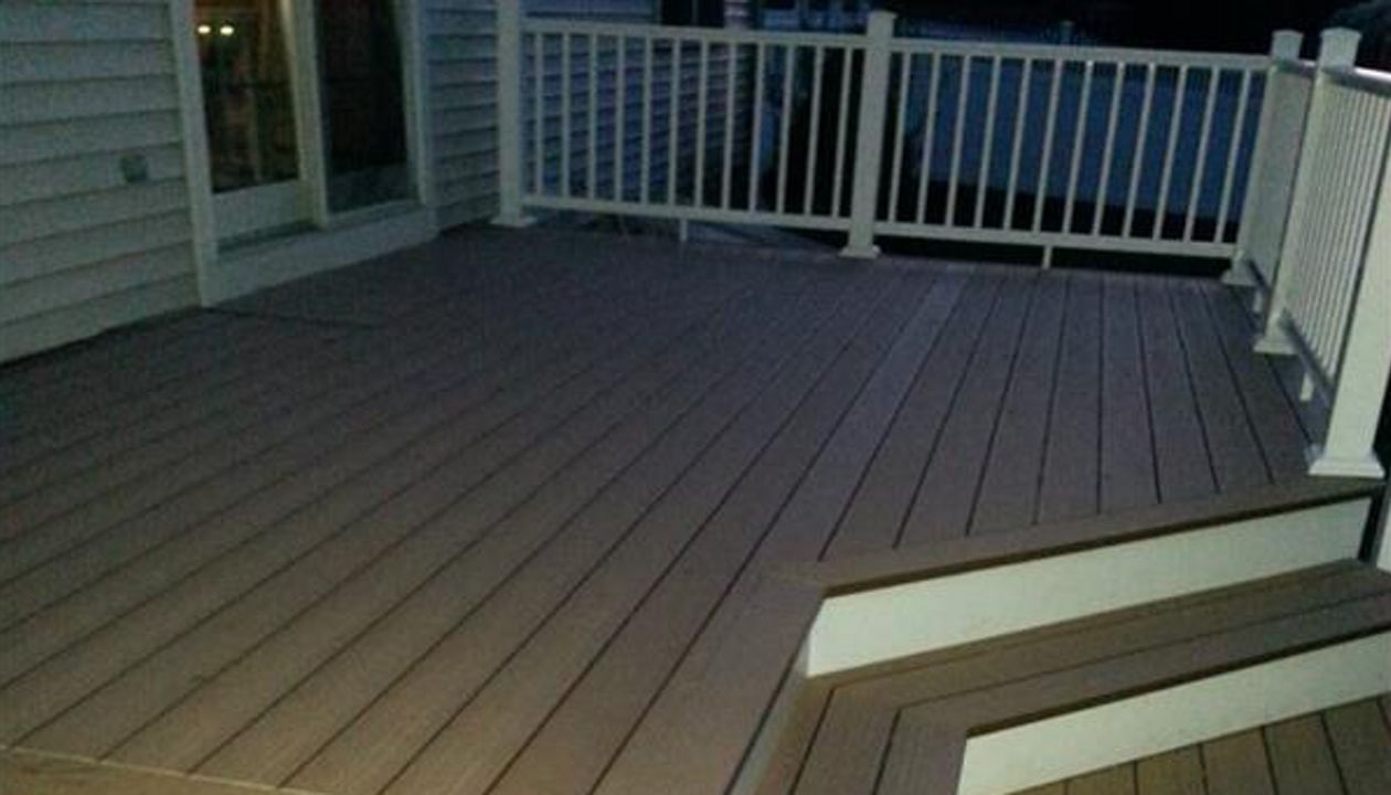 Custom Angles and step pads with Low Maintenance Decking used on this Outdoor Living Space in Madison CT