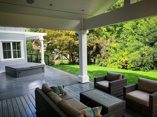 Island Mist field, risers, skirting, and fascia, with Clamshell bordering. Using multidirectional decking patterns is an excellent way to define spaces on large square footage decks.