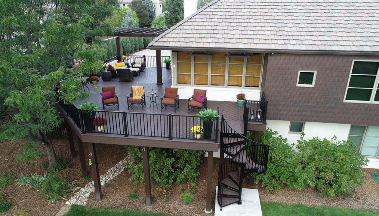 Trex Transcend Deck with Black Signature Aluminum railing with Trex Spiral Staircase