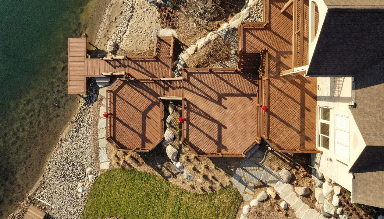 Trex Transcend Tiki Torch decking with Tree House for the cocktail railing, picture frame and fascia