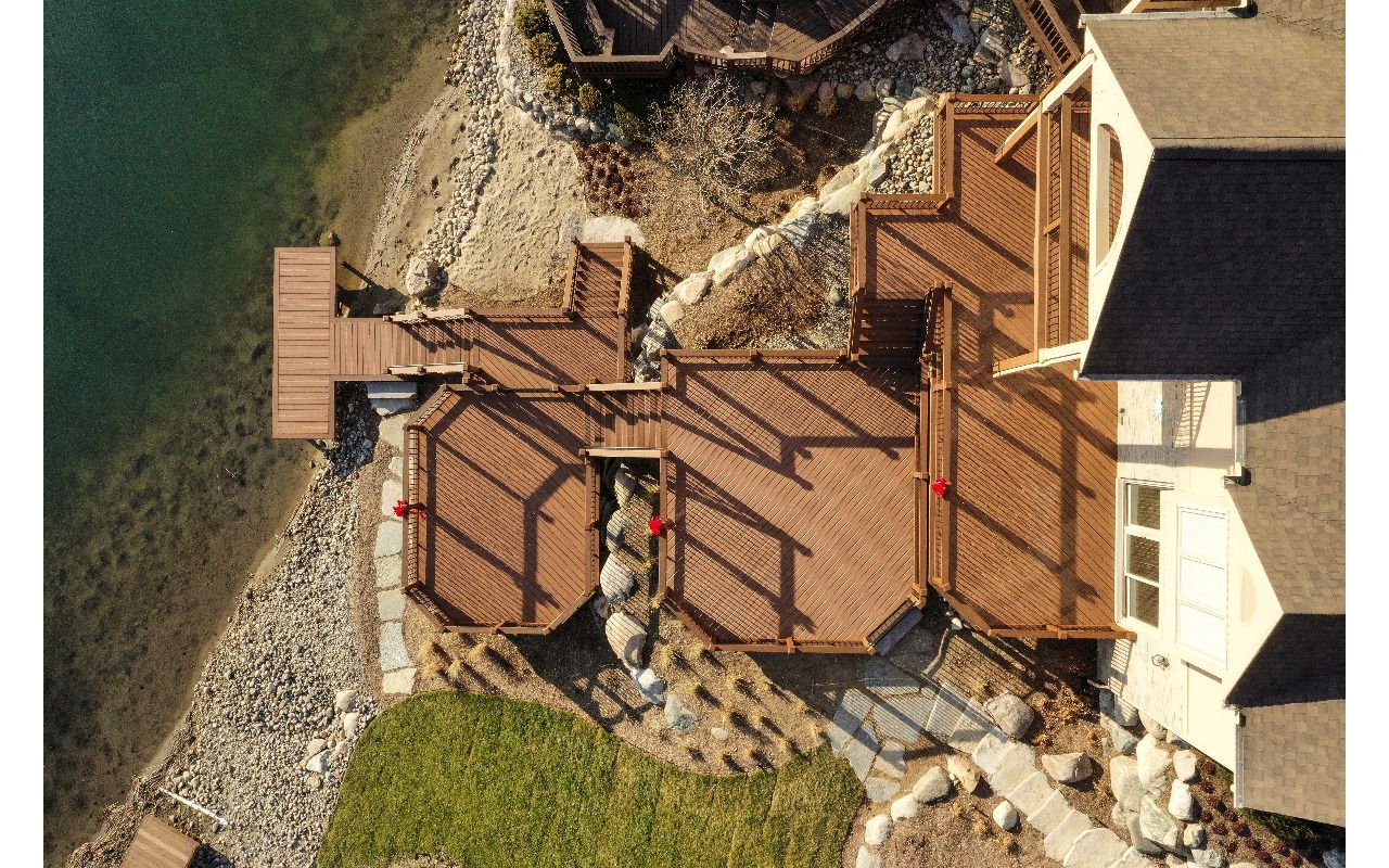 Trex Transcend Tiki Torch decking with Tree House for the cocktail railing, picture frame and fascia