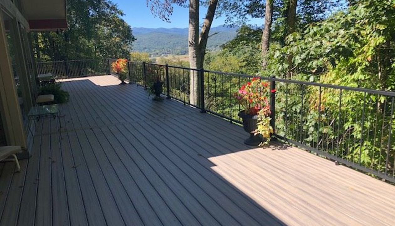 What an amazing view & outdoor living space from this new Trex Enhance Naturals Rocky Harbor deck!