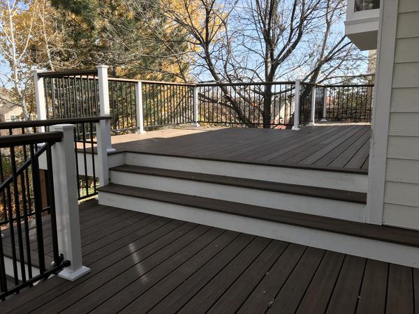 Spiced Rum decking, White Trex Fascia, elevation steel frame