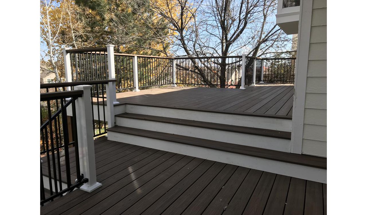 Spiced Rum decking, White Trex Fascia, elevation steel frame