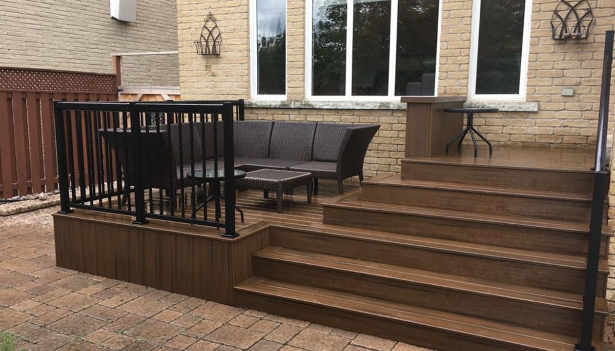 Small TREX Deck and stairs, both made with Fire Pit colour. Built in:  Aurora, King City, Oak Ridges, Richmond Hill, Newmarket, Toronto, Mississauga, Mount Albert, Vaughan, Bradford, Stouffville