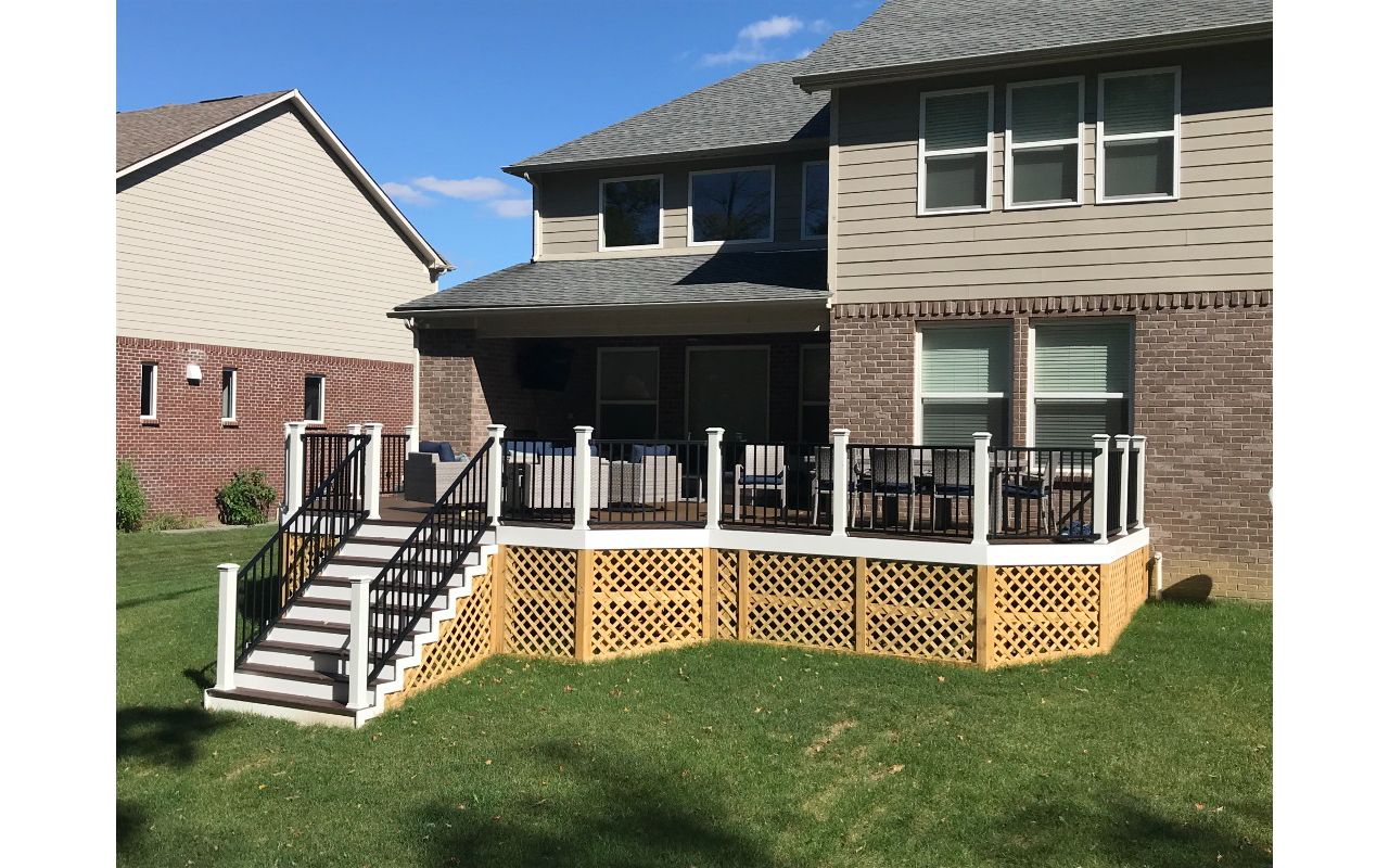 Trex Signature Aluminum Railing with Composite Posts, and Lattice Deck Skirting.