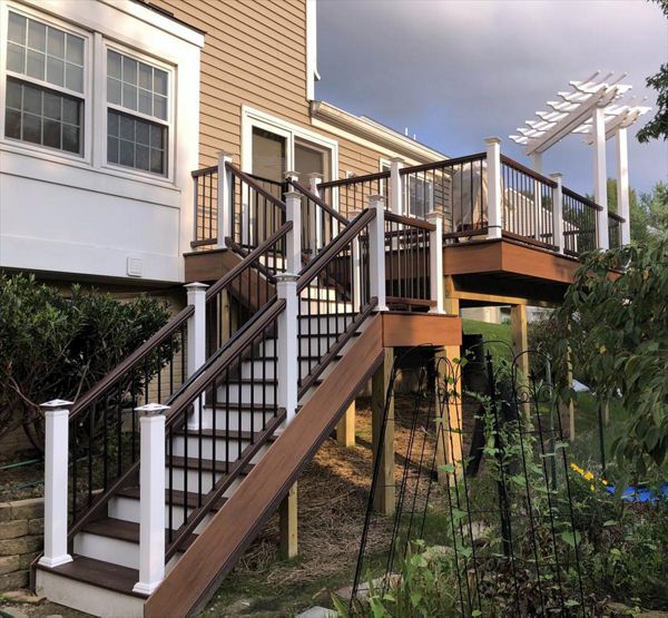 tiki torch skirt, lava rock treads, white risers, vintage lantern railing, white sleeves.