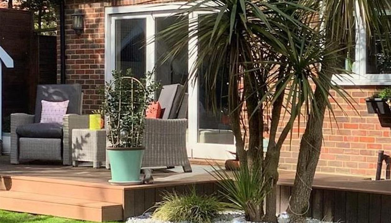 Trex Transcend Tiki Torch and Trex Transcend Spiced Rum Decking in Walton on Thames , England UK