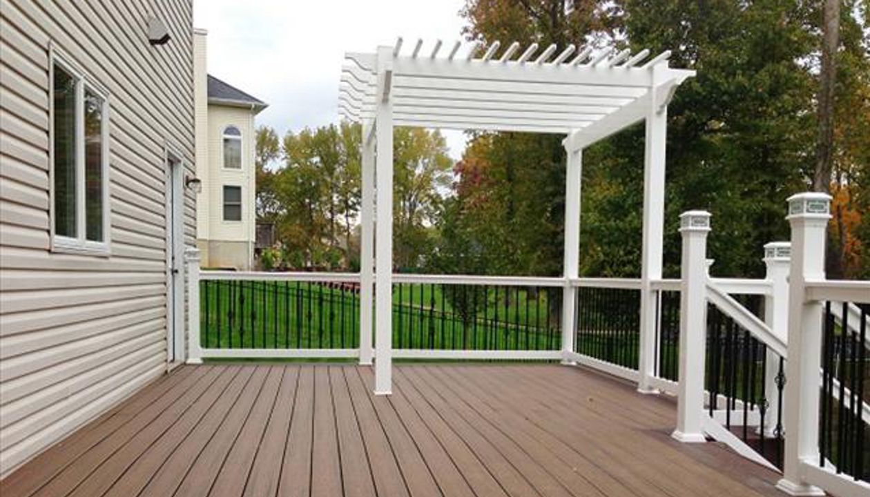 Trex in Tiki Toarch with custom pergola