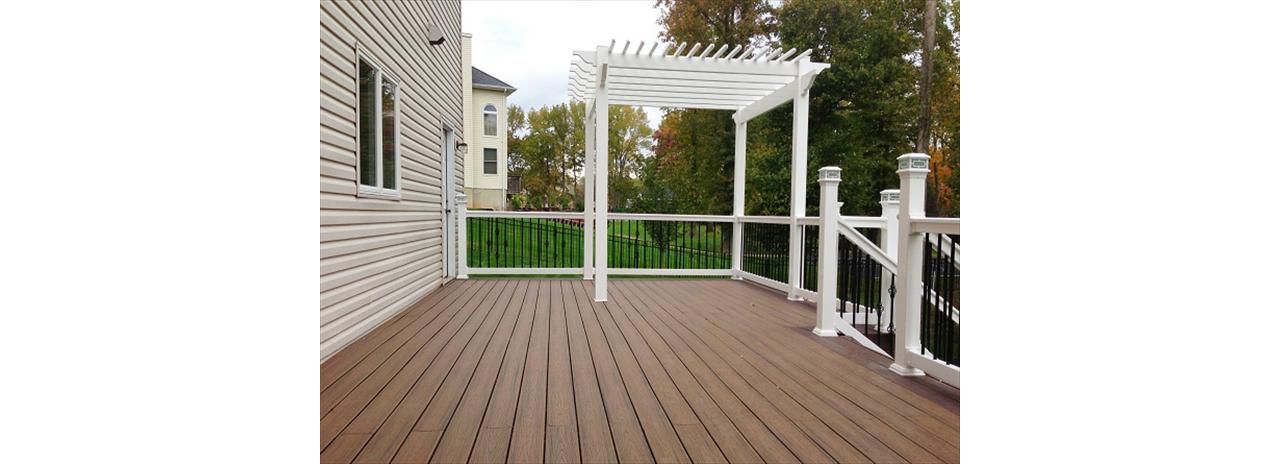 Trex in Tiki Toarch with custom pergola
