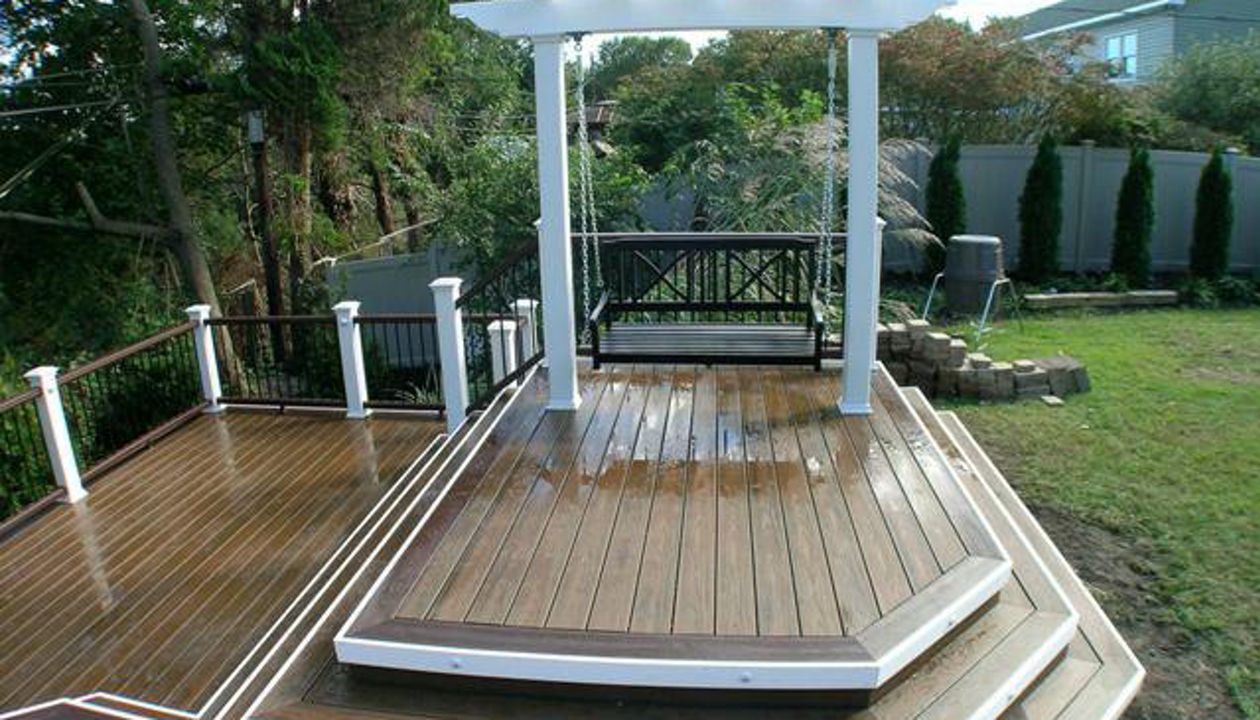Pergola with Swing on Island Deck in Smithtown, NY