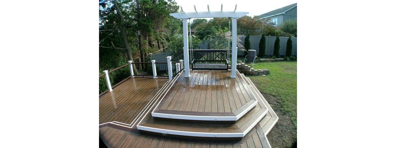 Pergola with Swing on Island Deck in Smithtown, NY